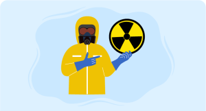 a person wearing yellow coat with face shield indicating decontamination and hazmat radiation